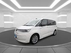 Candyweiß (white), solid Gebraucht 2024 VW T7 Style Van | 56.800 € (Fairer Preis)
