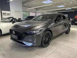 Machine gray Gebraucht 2024 Mazda 3 Nagisa Limousine | 24.990 € (Fairer Preis)