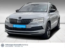 Stahlgrau Gebraucht 2021 Skoda Karoq SportLine SUV | 34.950 € (Fairer Preis)