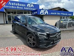 Kosmosschwarz metallic Gebraucht 2024 Mercedes GLB200 AMG Line Premium SUV | 48.990 € (Teuer)