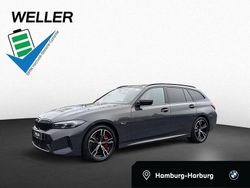 Grau Gebraucht 2022 BMW 330e Performance Kombi | 39.850 € (Teuer)