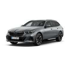 Grau Gebraucht 2024 BMW 550e M Sport Kombi | 76.853 € (Etwas zu teuer)