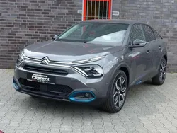 Grau Gebraucht 2022 Citroën e-C4 Shine Limousine | 23.382 € (Fairer Preis)