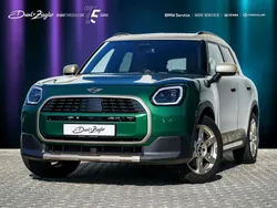 British racing green metallic Gebraucht 2024 Mini Cooper Countryman Favoured SUV | 40.950 €