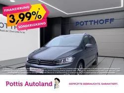 Grau Gebraucht 2022 VW Touran Active Van / Kleinbus | 21.221 € (Guter Preis)