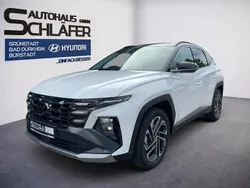 Serenity white / abyss black / Gebraucht 2024 Hyundai Tucson Prime SUV | 36.980 € (Guter Preis)