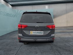 Grau Gebraucht 2024 VW Touran Pro Van / Kleinbus | 38.599 € (Etwas zu teuer)