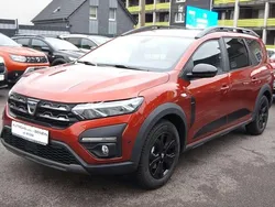 Terrakottabraunm (metallic) Gebraucht 2022 Dacia Jogger Extreme Kombi | 15.980 € (Guter Preis)