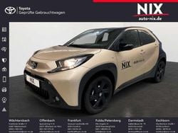 Ginger beige metallic/ night sky black Gebraucht 2024 Toyota Aygo X Team SUV | 15.850 € (Guter Preis)