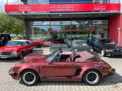 Rot (granatrot metallic) Gebraucht 1986 Porsche 911 Cabrio | 115.500 €