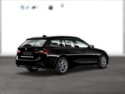 Schwarz Gebraucht 2021 BMW 320e Sport Line Kombi | 29.270 € (Fairer Preis)