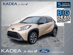 Ginger beige (4u9)/ black mica Neu 2025 Toyota Aygo X SUV | 15.880 €