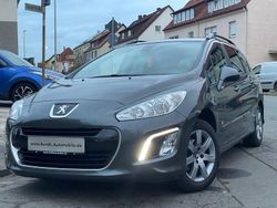 Grau Gebraucht 2014 Peugeot 308 SW Style Kombi | 3.200 €