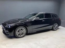 Obsidianschwarz Gebraucht 2024 Mercedes C300 AMG Kombi | 59.980 €
