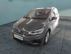 Grau Gebraucht 2024 VW Touran Highline Van / Kleinbus | 37.200 € (Fairer Preis)