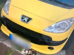 Gelb Gebraucht 2006 Peugeot 1007 Kleinwagen | 650 €