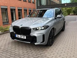 Grau Gebraucht 2024 BMW X5 SUV | 87.990 € (Teuer)