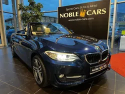 Tiefseeblau metallic (metallic) Gebraucht 2016 BMW 218 Sport Line Cabrio | 20.890 € (Fairer Preis)