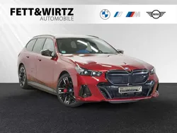 Fire red Gebraucht 2024 BMW i5 Limousine | 79.888 €