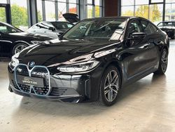 Schwarz ii/bonnet fluid black Gebraucht 2023 BMW i4 Sport Line Limousine | 36.900 €