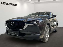 Grau (machine grey) Gebraucht 2025 Mazda CX-30 Exclusive-Line SUV | 29.990 €