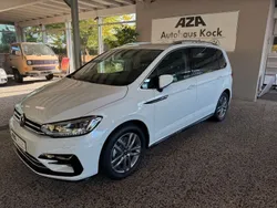 Pure white Gebraucht 2024 VW Touran R-line Van / Kleinbus | 38.685 € (Fairer Preis)