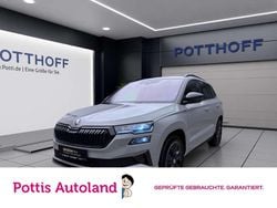 Grau Gebraucht 2024 Skoda Karoq SportLine SUV | 32.777 € (Superpreis)