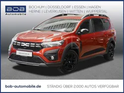 Terracottabraun met (braun) Gebraucht 2023 Dacia Jogger Extreme Van / Kleinbus | 19.870 € (Fairer Preis)