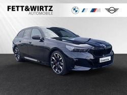 Carbonschwarz metallic Gebraucht 2024 BMW 530e M Sport Kombi | 69.490 €