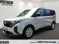Grau Gebraucht 2024 Ford Tourneo Courier Titanium Van / Kleinbus | 24.990 € (Fairer Preis)