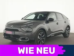 Grau Gebraucht 2023 Citroën e-C4 Shine Limousine | 20.816 € (Fairer Preis)