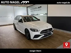 Polarweiß Gebraucht 2024 Mercedes C300e AMG Kombi | 43.879 € (Superpreis)