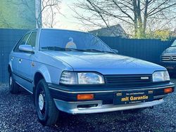 Silber Gebraucht 1989 Mazda 323 Kleinwagen | 3.100 €