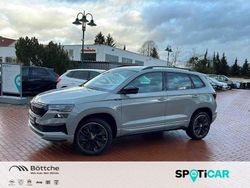Steelgrau Gebraucht 2024 Skoda Karoq SportLine SUV | 39.370 € (Teuer)