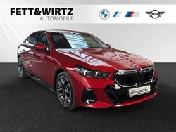 Fire red metallic Gebraucht 2024 BMW i5 M Sport Limousine | 60.800 €