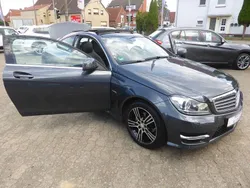 755 tenoritgrau Gebraucht 2015 Mercedes C180 AMG Coupé | 18.990 € (Guter Preis)
