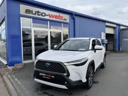 Weiß (metallic) Gebraucht 2024 Toyota Corolla Hybrid Style SUV | 37.950 €