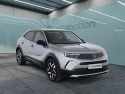 Grau Gebraucht 2022 Opel Mokka-e Elegance SUV | 20.580 € (Fairer Preis)