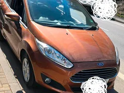 Orange Gebraucht 2013 Ford Fiesta Titanium Kleinwagen | 3.999 €