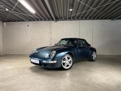 Aventuragrünmetallic Gebraucht 1995 Porsche 911 Carrera Cabrio | 60.390 €