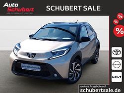 Ginger beige metallic/ night sky black Gebraucht 2024 Toyota Aygo Comfort Kleinwagen | 16.890 € (Fairer Preis)