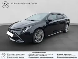 Schwarz black mica / ink Gebraucht 2021 Toyota Corolla Hybrid Team Kombi | 23.490 € (Fairer Preis)