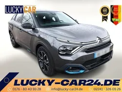 Grau Gebraucht 2023 Citroën e-C4 Shine Limousine | 21.617 € (Guter Preis)