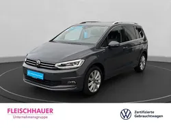 Grau Gebraucht 2024 VW Touran Highline Van / Kleinbus | 37.990 € (Etwas zu teuer)