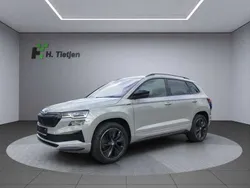 Grau Gebraucht 2024 Skoda Karoq SportLine SUV | 37.490 € (Fairer Preis)