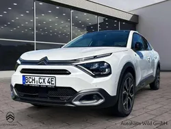 Perlmuttweiss/perlm Gebraucht 2023 Citroën e-C4 Shine Limousine | 33.900 €