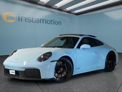 Blau Neu 2025 Porsche 911 Carrera 4 Coupé | 233.649 €