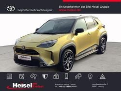 Warm gold metallic, dach schwarz Gebraucht 2021 Toyota Yaris Hybrid Advance | 24.990 € (Teuer)