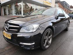 Obsidianschwarz (metallic) Gebraucht 2015 Mercedes C180 AMG Coupé | 20.950 € (Fairer Preis)