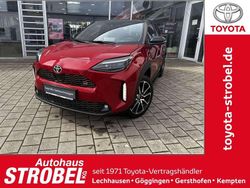 Karminarot metallic, dach schwarz Gebraucht 2023 Toyota Yaris Hybrid Sport SUV | 29.690 € (Teuer)